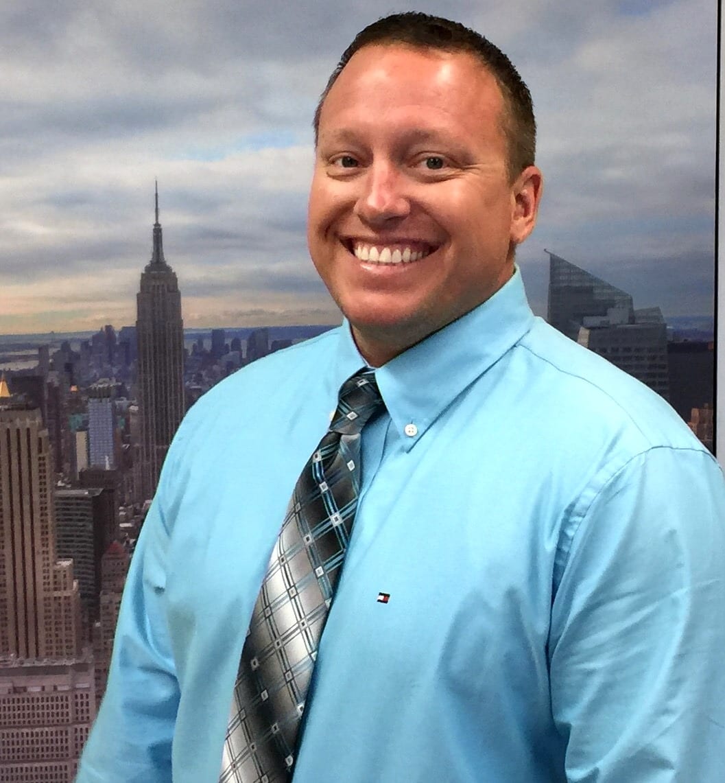 Eric Freeman in front of the New York skyline